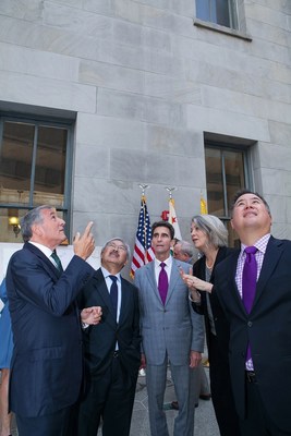San Francisco Mayor Ed Lee along with State Senator Mark Leno and Assemblymember Phil Ting look on as California Historical Society executives highlight architectural aspects of the treasured Old U.S. Mint building.  L to R: Mike Sangiacomo, CHS Board of Trustees president; Mayor Lee; Senator Leno; Anthea Hartig, executive director, CHS; Assemblymember Ting.  (Photo credit: Amy Sullivan)