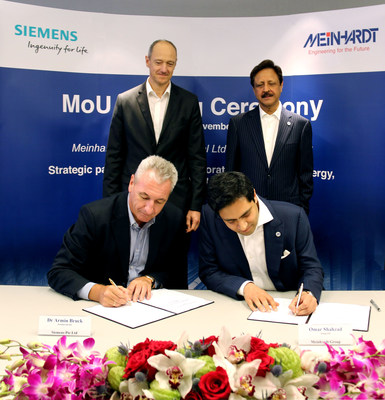Witnessing the signing ceremony are Dr. Roland Busch Managing Board member of Siemens AG (pictured on the top left) & Dr S. Nasim, Executive Group Chairman, Meinhardt Group International Ltd (top right). Dr. Armin Bruck, President and CEO Siemens Pte Ltd is pictured on the bottom left & Mr Omar Shahzad, Group CEO, Meinhardt Group International Ltd is pictured on the bottom right.
