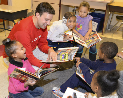 Delta Station Manager reads to children at YMCA