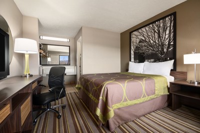 Super 8's redesign centers around elevated guestrooms that feature new bedding and curtains, a refreshed color palette, sleek finishings, modern amenities and signature black and white artwork. Above, the Super 8 in Wytheville, Va.