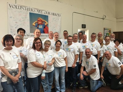 The Sales and Executive Teams of Toshiba Telecommunication Systems Division spent a day stocking the food pantry at South County Outreach.