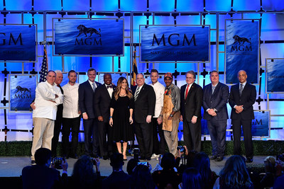 Participants and special guests at MGM National Harbor Grand Opening Press Conference (L-R): Chef Jose Andres, Maryland Senate President Mike Miller, Chef Bryan Voltaggio, CEO & Chairman of MGM Resorts International Jim Murren, County Executive Rushern Baker, Sarah Jessica Parker, Maryland Governor Larry Hogan, Chef Michael Voltaggio, Chef Marcus Samuelsson, Maryland Lottery & Gaming Control Agency Director Gordon Medenica, MGM National Harbor General Manager Bill Boasberg and MGM National Harbor President & COO Lorenzo Creighton.